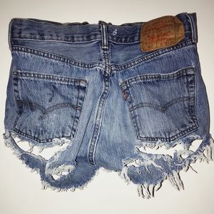one of a kind ripped jean button up shorts